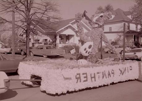 The Pink Panther visited his friend 鲍比熊猫 during the 1973 Homecoming Parade at Northwest.  The Pink Panther was a series of comedy films featuring the bumbling French police detective Jacques Clouseau that began in 1963 with the release of the film of the same name. 